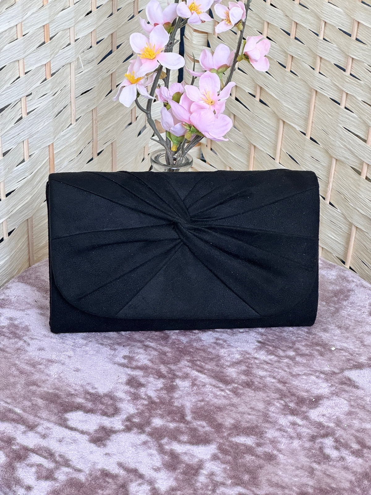 Suedette twisted front clutch
